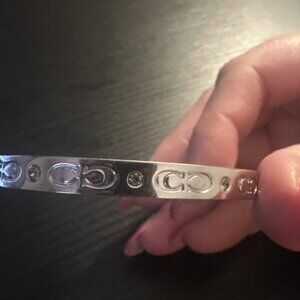 Coach sterling silver Kissing "c" bracelet